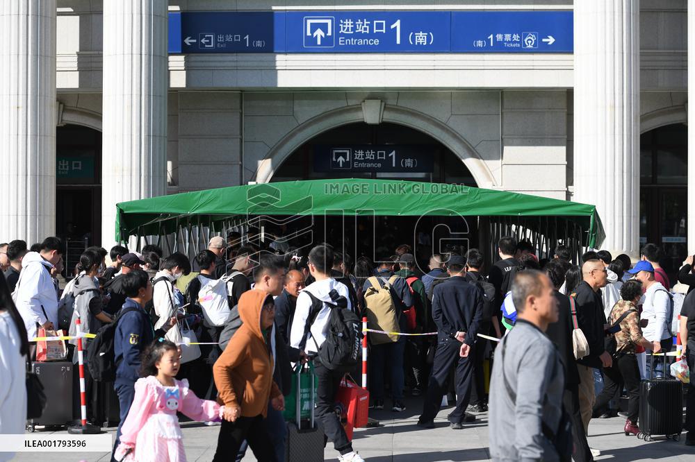 Tourists Line Up at Changchun Railway Station in Changchun