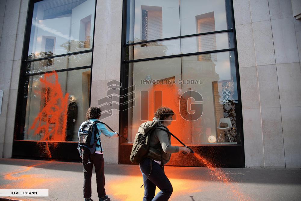 Activists Spray Louis Vuitton Window With Orange Paint - Paris