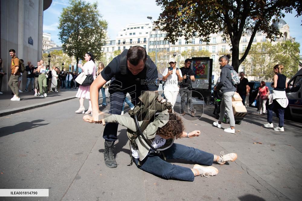 Activists Spray Louis Vuitton Window With Orange Paint - Paris