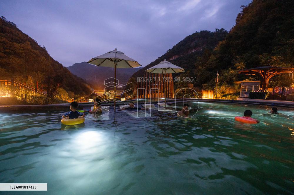 Tourists Soak in Hot Springs in Bijie