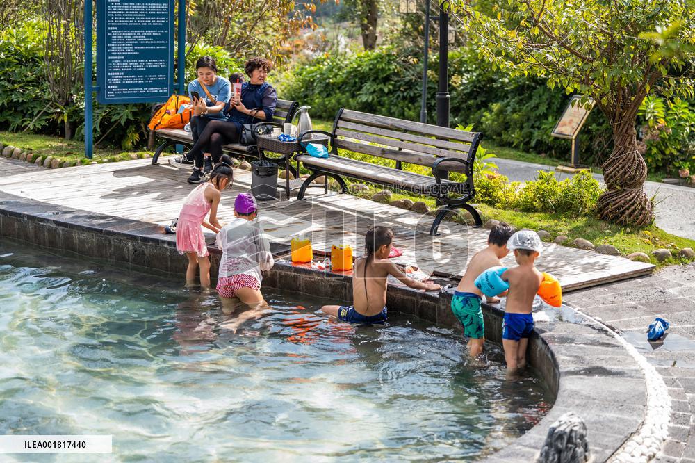 Tourists Soak in Hot Springs in Bijie