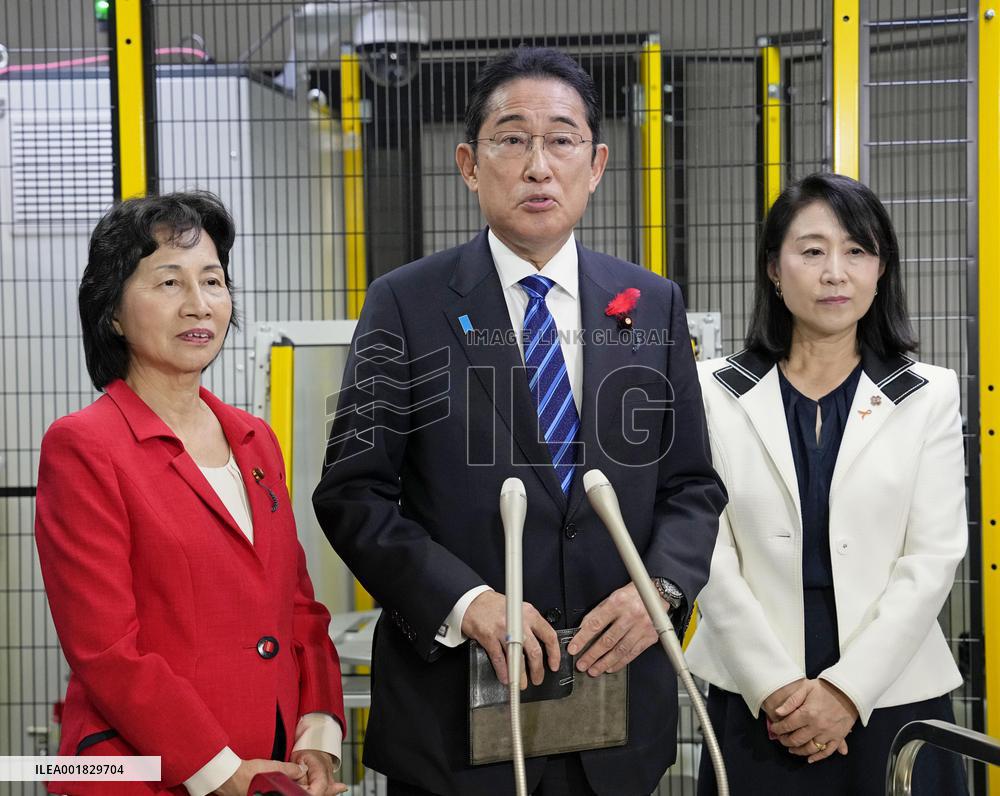 Japan PM visits small rubber product maker in Tokyo