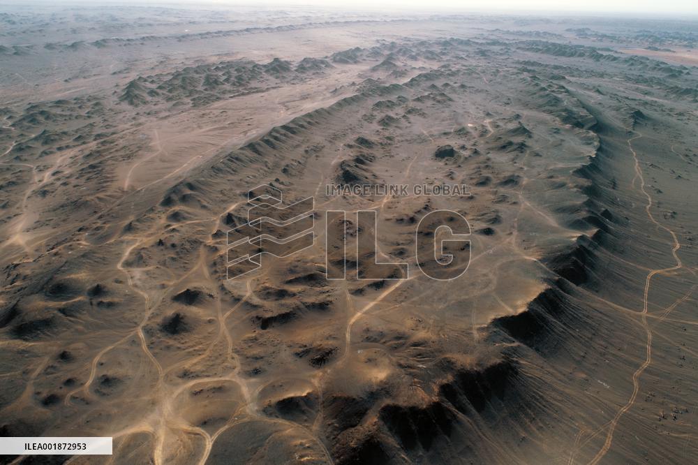 An Elliptical Crater Basin in The Gobi in Hami