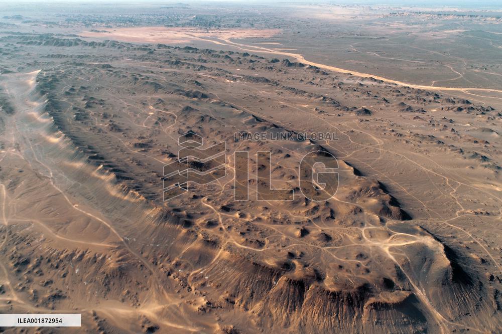An Elliptical Crater Basin in The Gobi in Hami