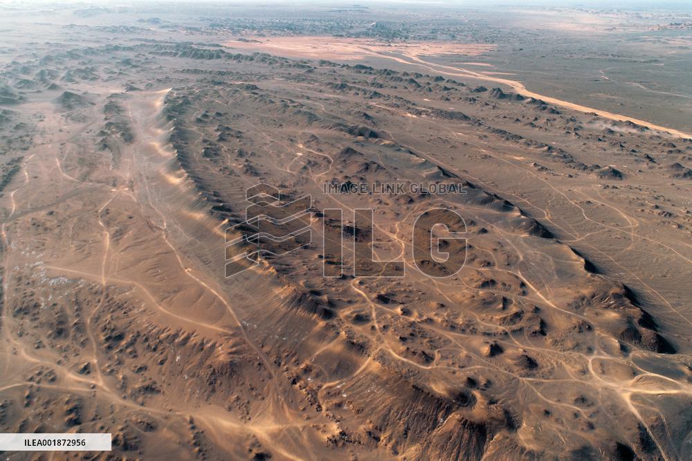 An Elliptical Crater Basin in The Gobi in Hami