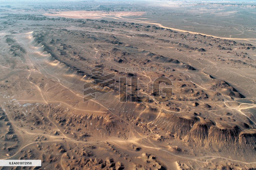 An Elliptical Crater Basin in The Gobi in Hami