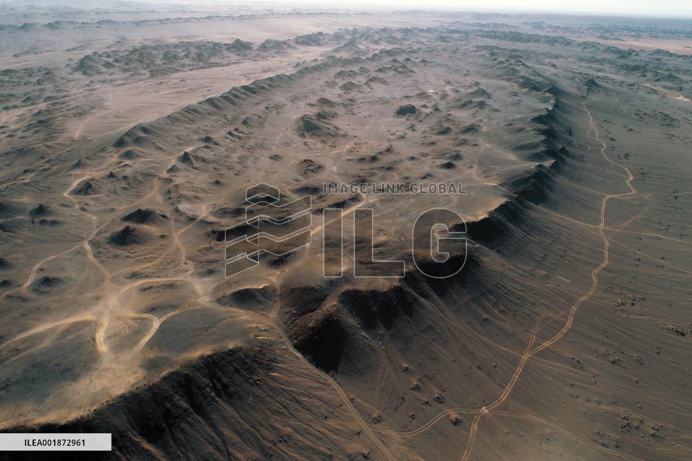 An Elliptical Crater Basin in The Gobi in Hami