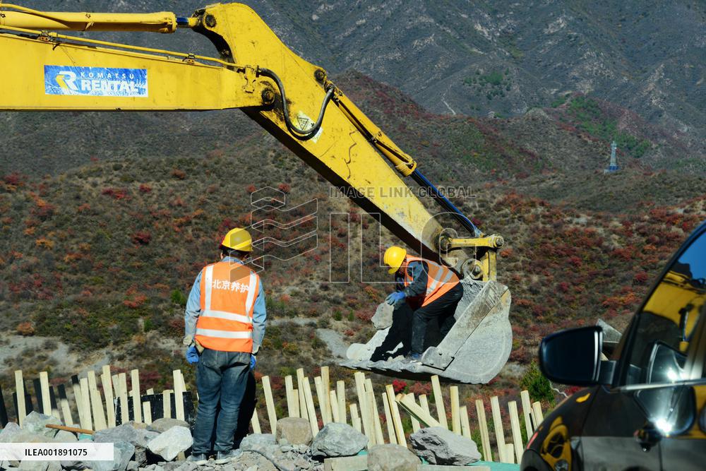 Workers Repair And Reinforce A Damaged Road in Mentougou of Beijing