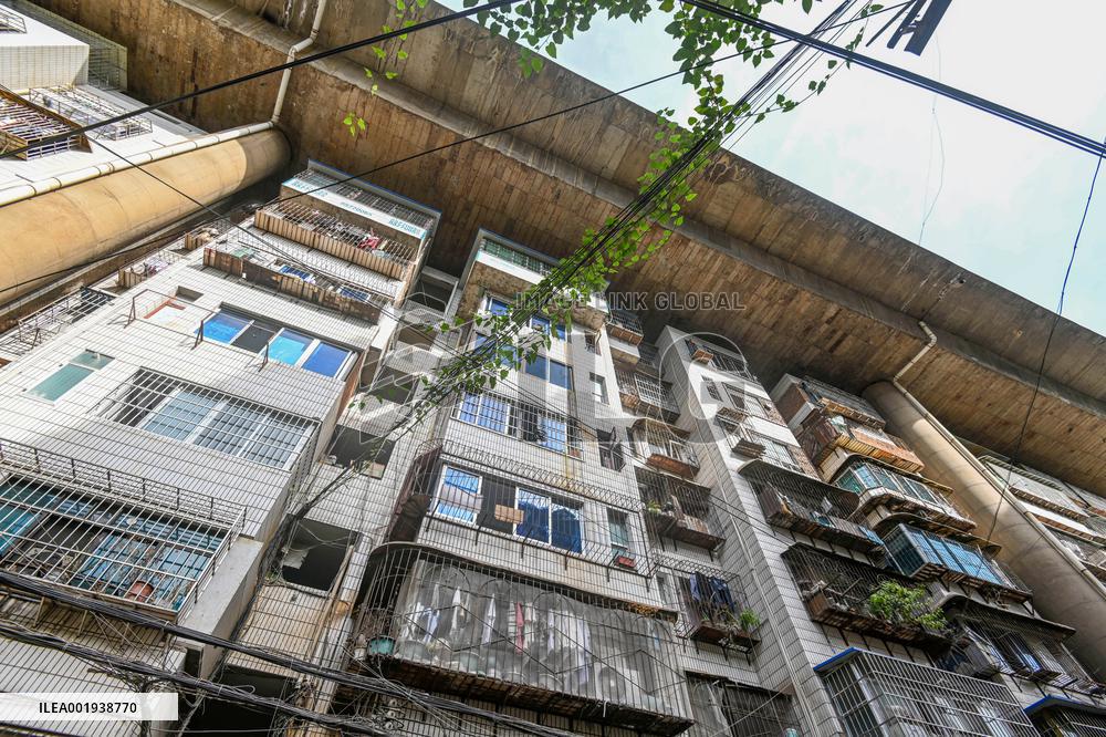 The Residential Building Under A Bridge in Guiyang