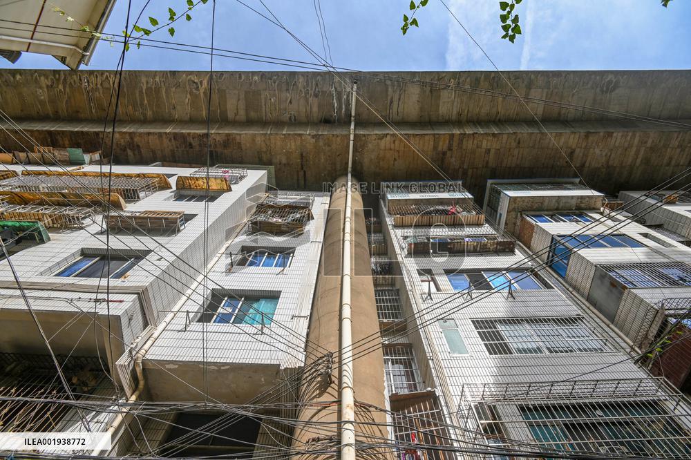 The Residential Building Under A Bridge in Guiyang