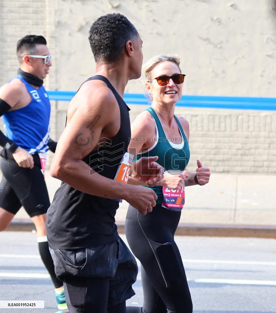 Amy Robach and TJ Holmes running the New York Marathon 2023