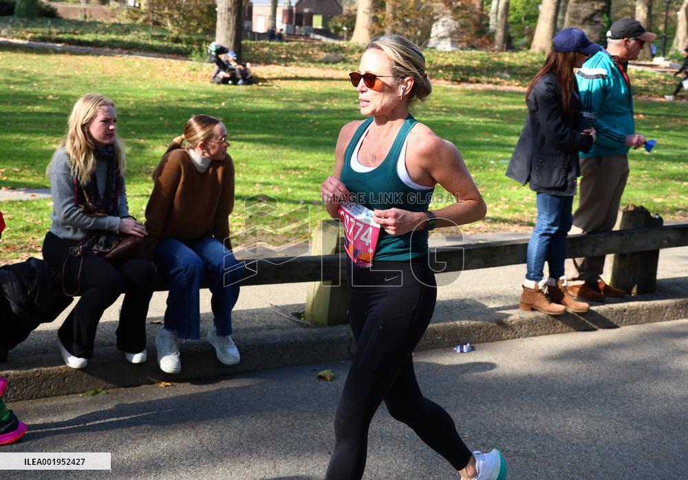 Amy Robach and TJ Holmes running the New York Marathon 2023