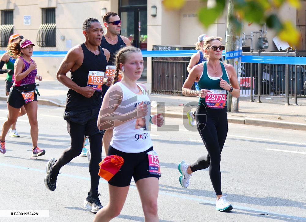Amy Robach and TJ Holmes running the New York Marathon 2023