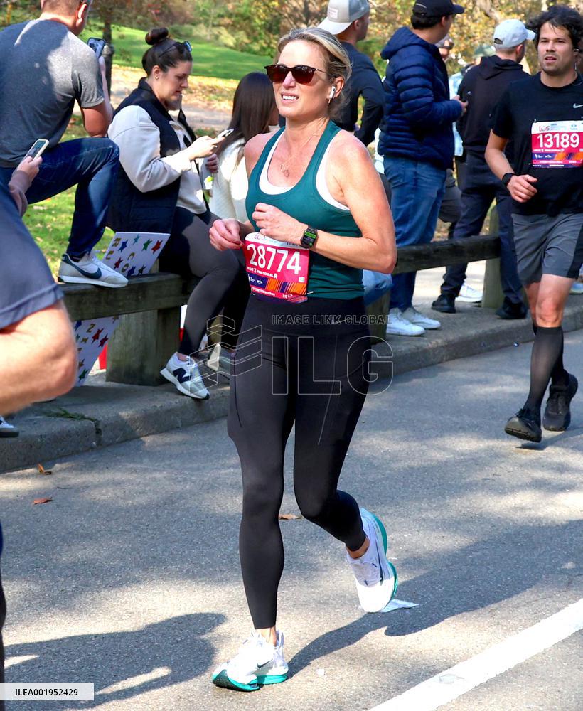 Amy Robach and TJ Holmes running the New York Marathon 2023