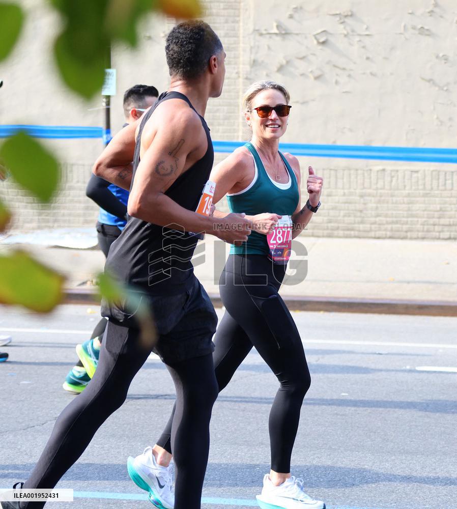 Amy Robach and TJ Holmes running the New York Marathon 2023
