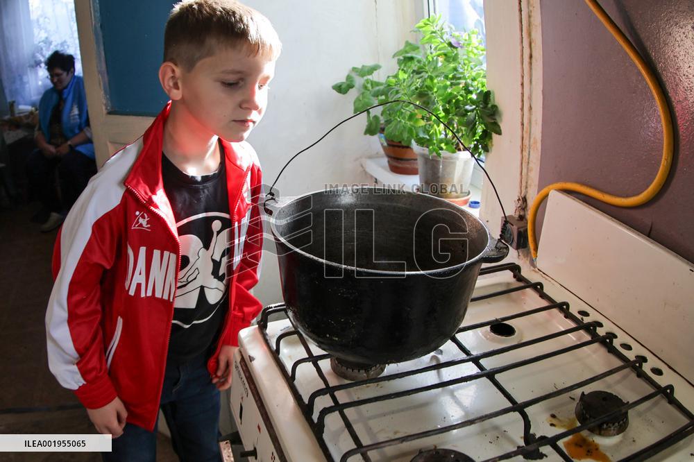 Making of tin can lamps for Ukrainian military in Kyiv Region
