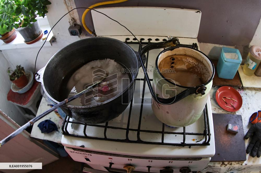 Making of tin can lamps for Ukrainian military in Kyiv Region