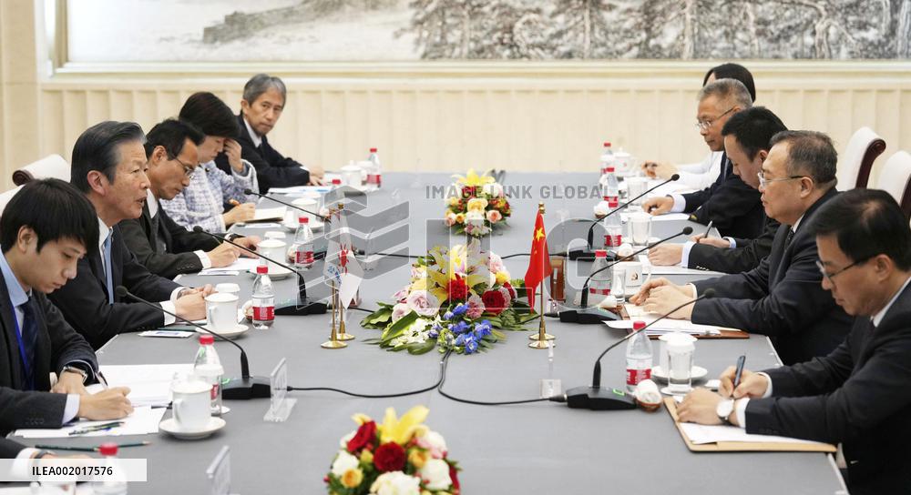 Komeito head meets senior China official