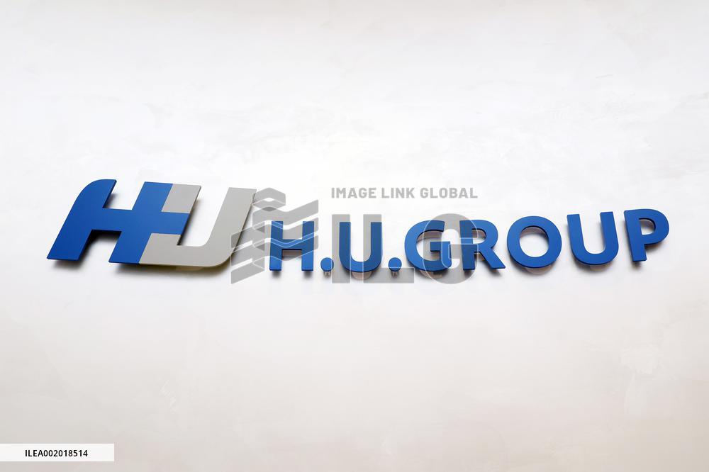 H.U. Group Holdings signage and logo