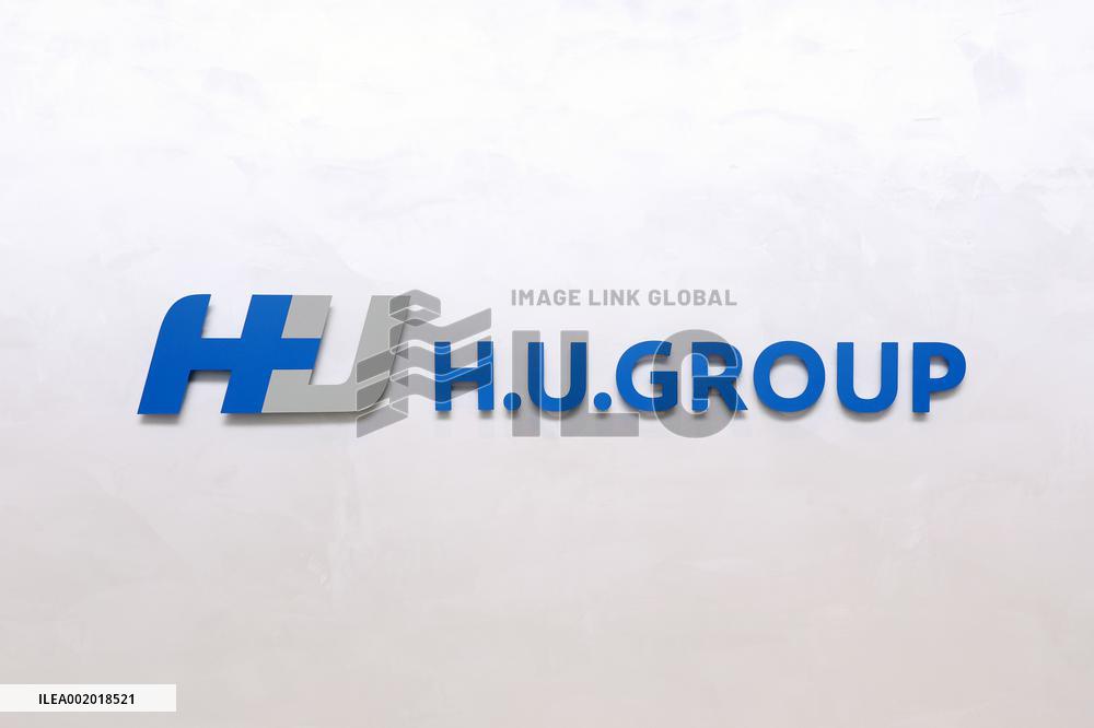 H.U. Group Holdings signage and logo