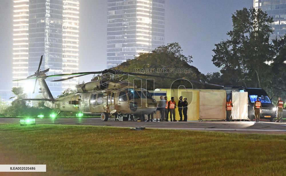 Hostages released by Hamas arrive in Tel Aviv