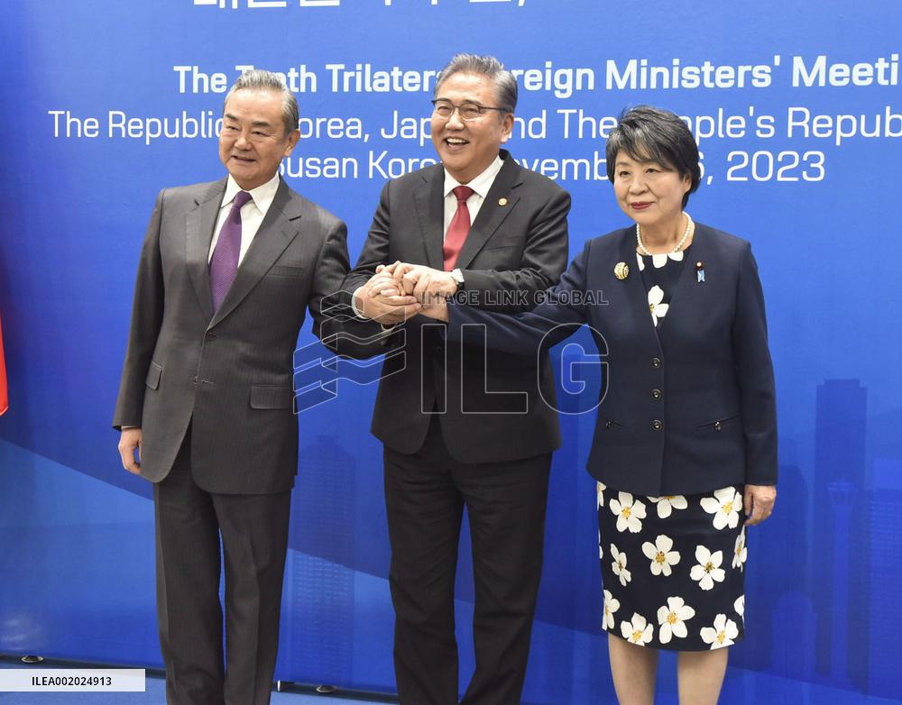 Top diplomats of Japan, South Korea and China
