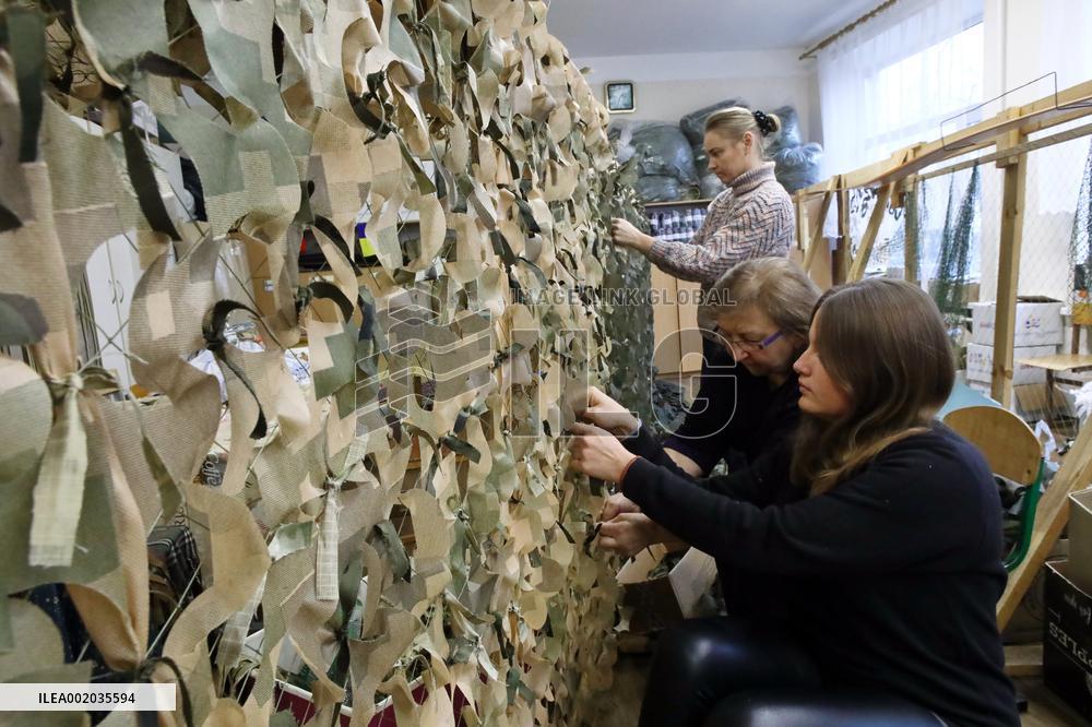 Kyiv Region volunteers make camouflage nets and uniforms for Ukrainian military