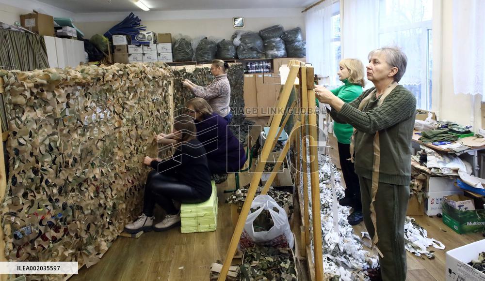 Kyiv Region volunteers make camouflage nets and uniforms for Ukrainian military