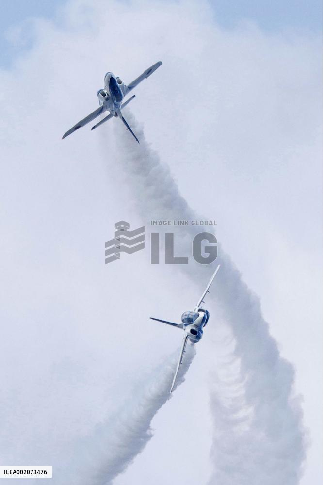 Blue Impulse aerobatic team flies over Okinawa