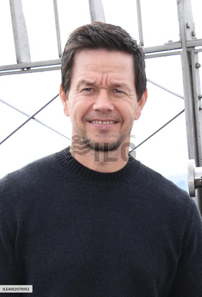 Cast Of Apple TV+'s The Family Plan Visit The Empire State Building - NYC