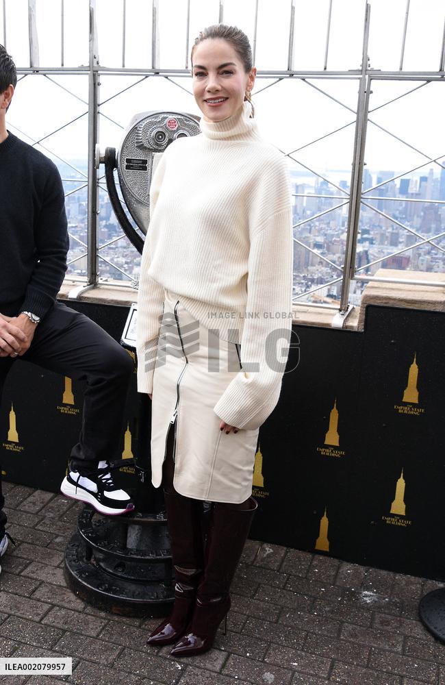 Cast Of Apple TV+'s The Family Plan Visit The Empire State Building - NYC