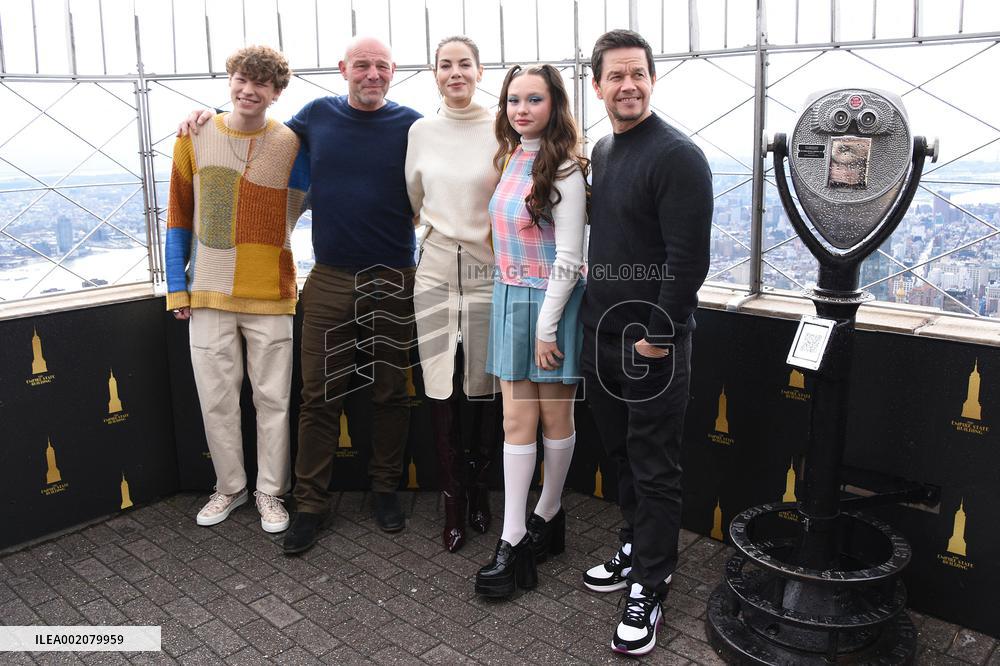 Cast Of Apple TV+'s The Family Plan Visit The Empire State Building - NYC