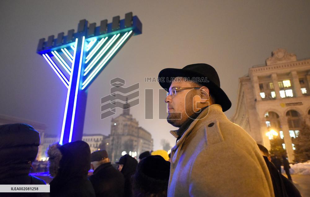 Lighting Hanukkah candles in Kyiv