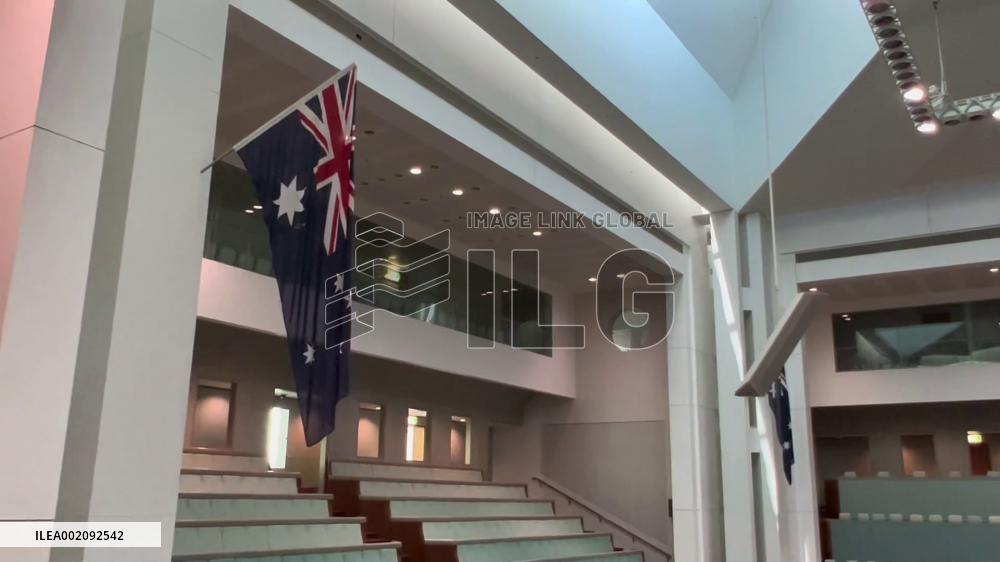 Higher tax earnings slash Australian budget deficit