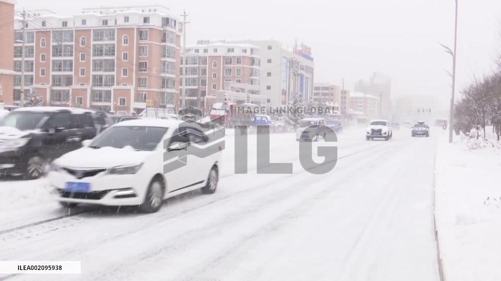 China swings into action to tackle cold wave