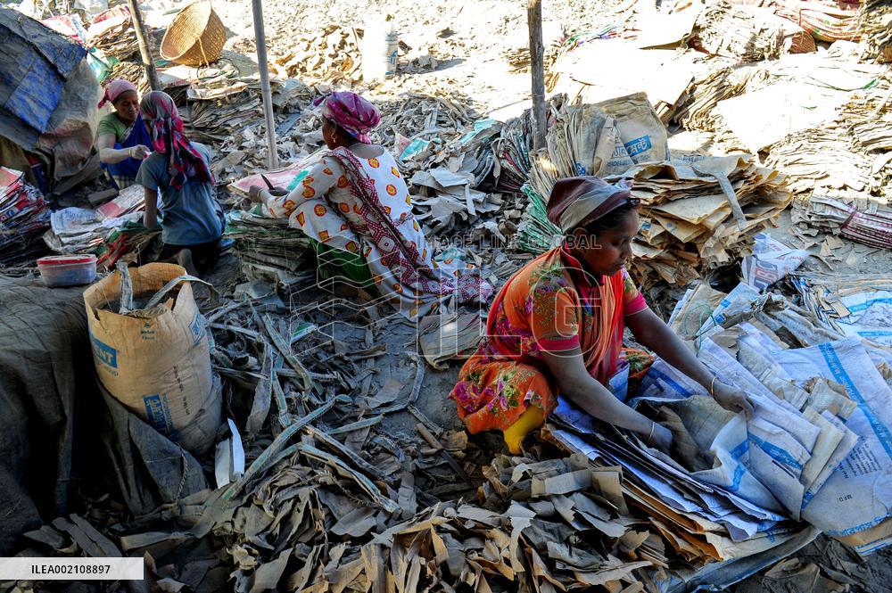 People Work Recycling Cement Bags - Bangladesh