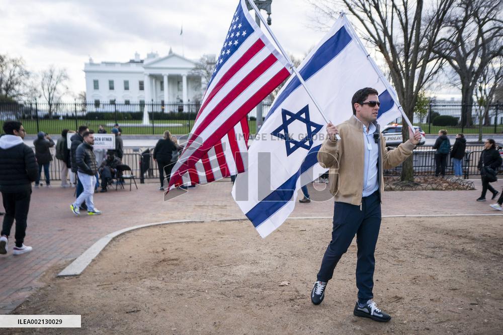 Israeli flags displayed in front of the WHite House
