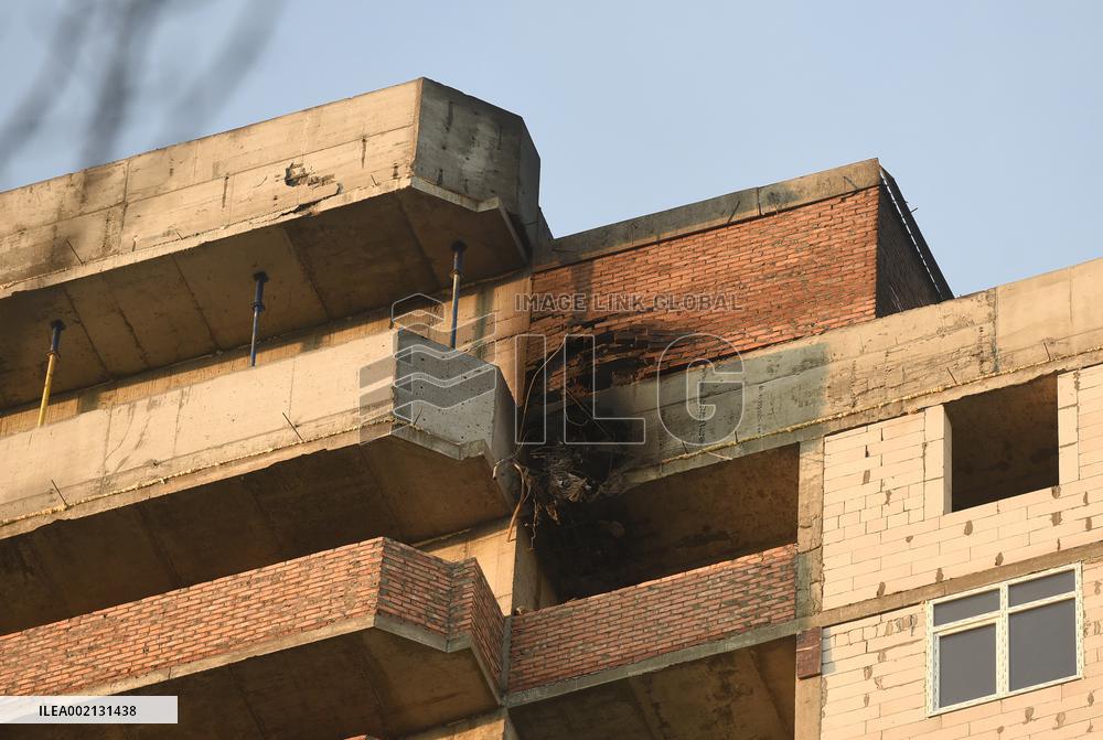 Russian missile fragments hit unfinished building in Kyiv