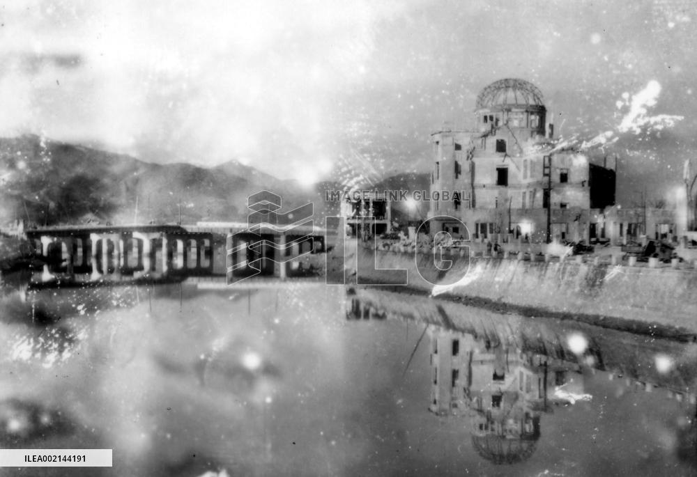 Wrecked Hiroshima Prefectural Industrial Promotion Hall (now the A-bomb Dome) and Aioi Bridge
