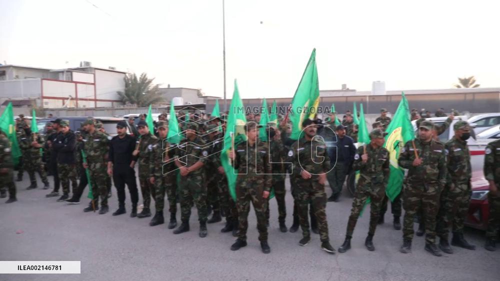 Iraqi paramilitary forces hold funeral for drone attack victims in Baghdad