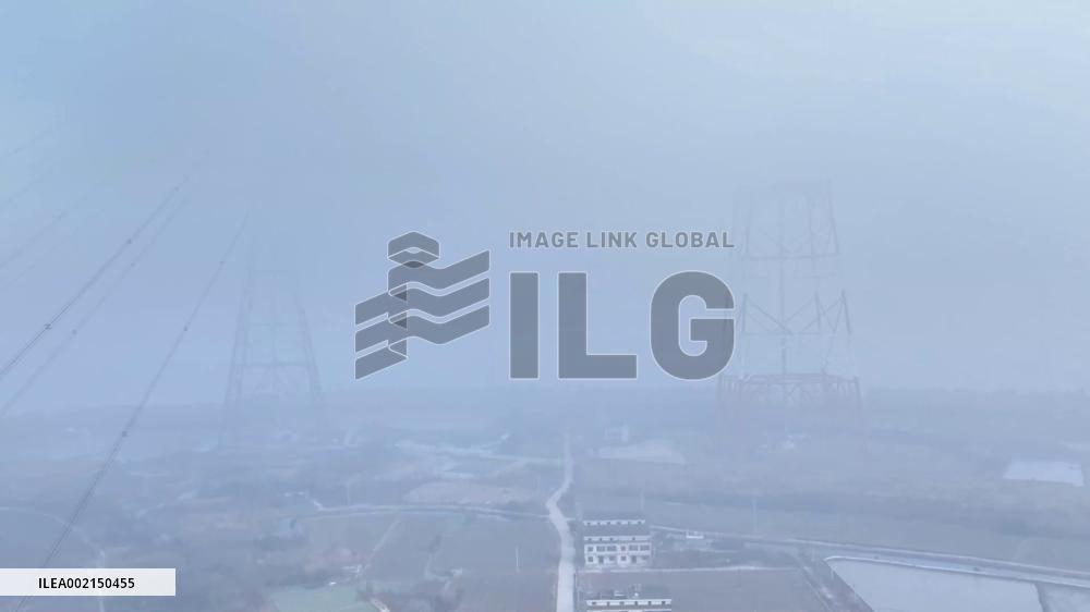 Stunning view of world's tallest power transmission tower in morning mist
