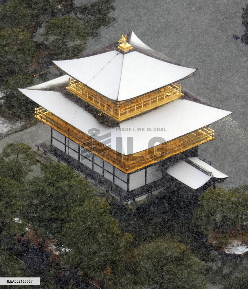 Snow-covered Kinkaku-ji temple