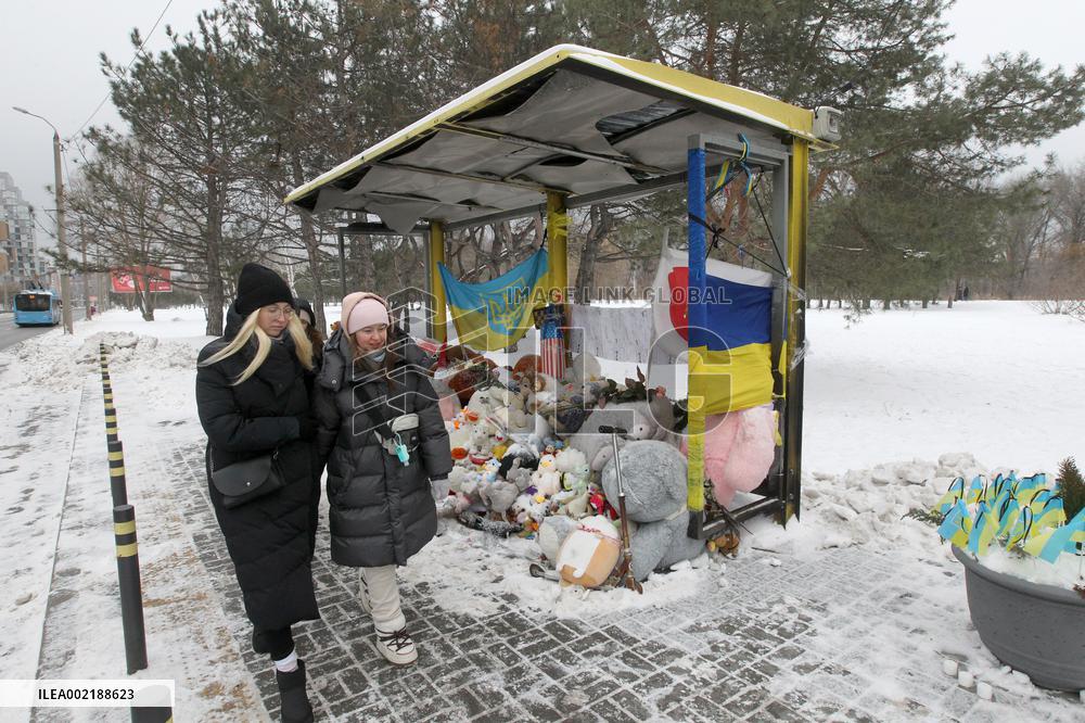 Memorial outside Dnipro apartment block ruined by Russian troops