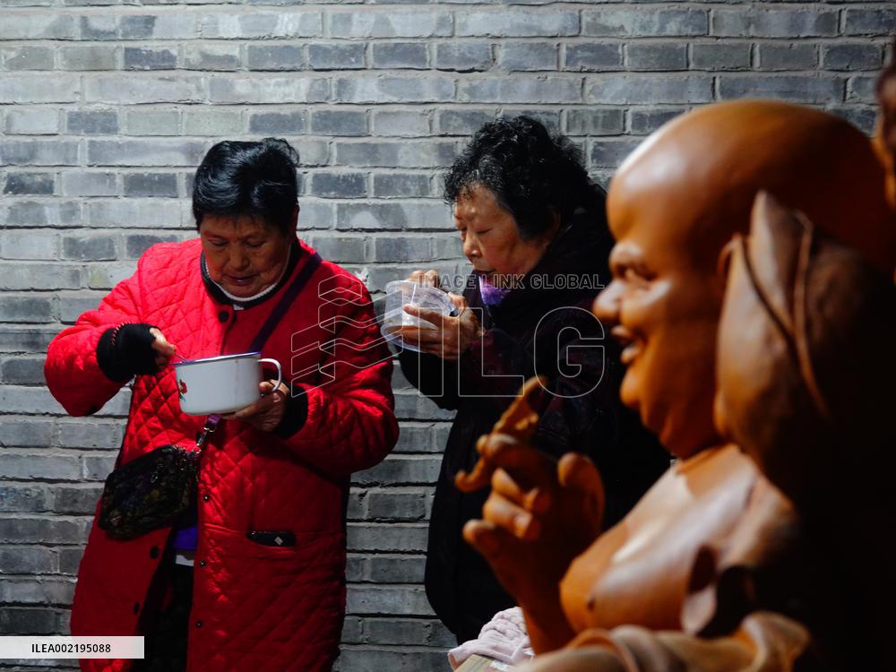 People Receive The BUDDHA PORRIDGE in Yichang
