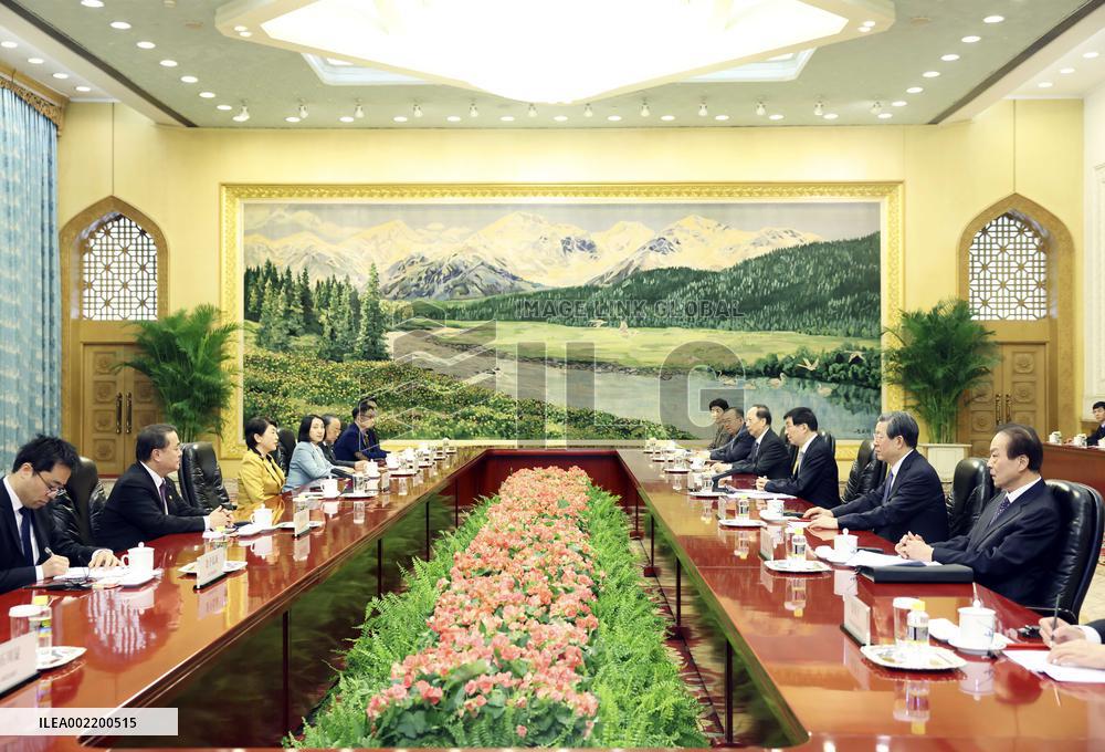 CHINA-BEIJING-WANG HUNING-JAPAN-SOCIAL DEMOCRATIC PARTY DELEGATION-MEETING (CN)