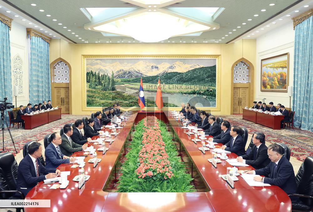 CHINA-BEIJING-WANG HUNING-LAOS-LFNC-PRESIDENT-MEETING (CN)