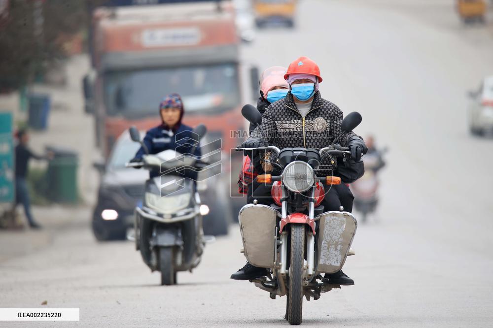 Migrant Workers Ride Motorcycles Home for The Spring Festival