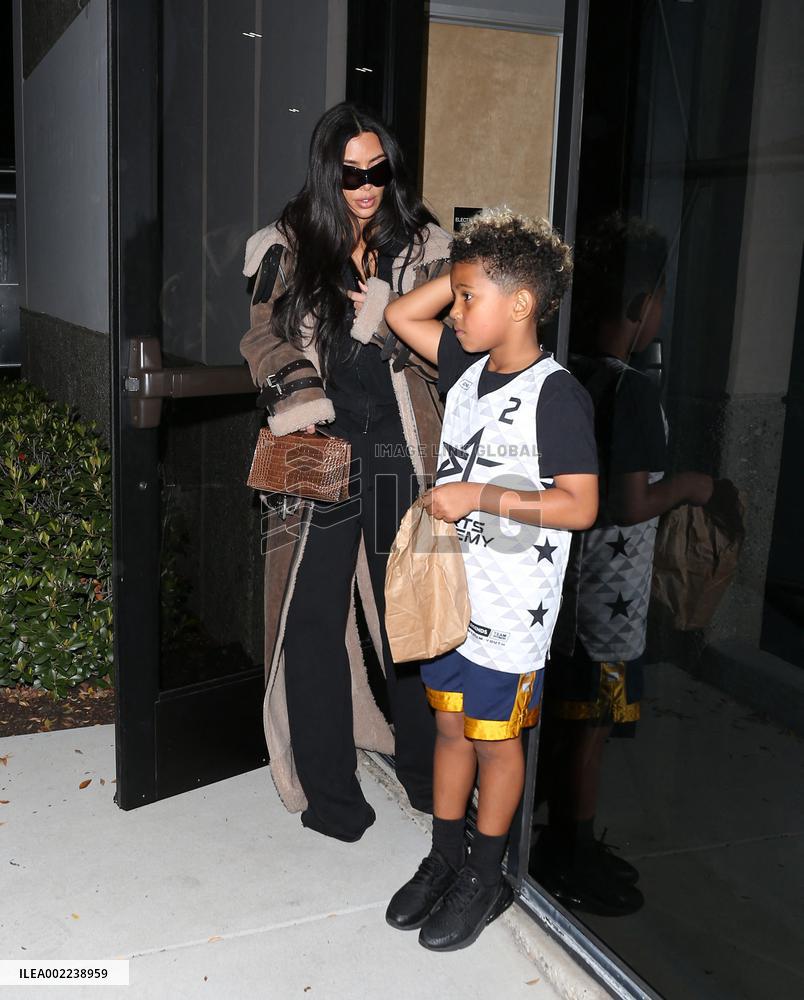 Kim Kardashian and Kanye West attend childrens basketball game - LA