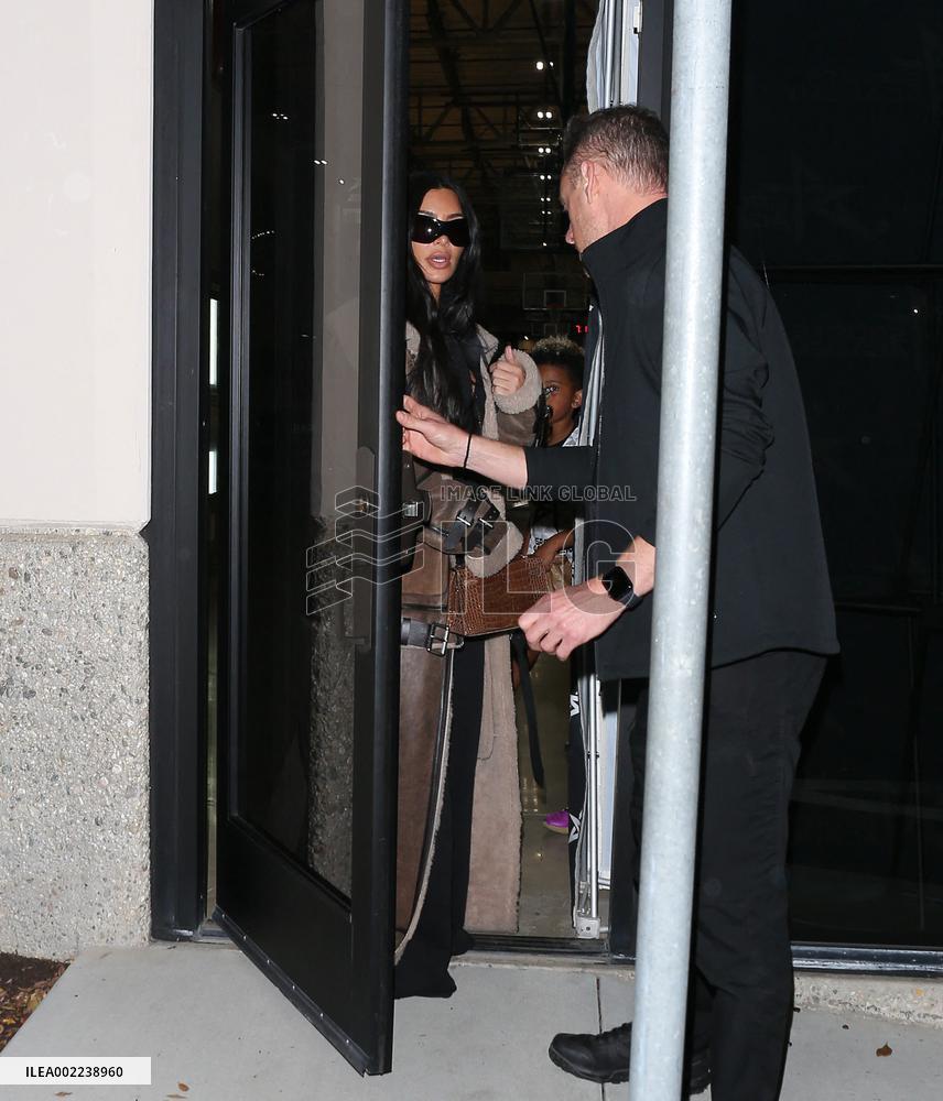 Kim Kardashian and Kanye West attend childrens basketball game - LA