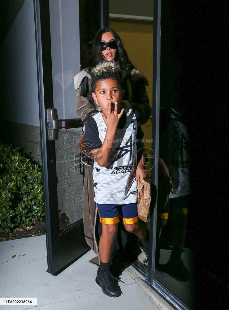Kim Kardashian and Kanye West attend childrens basketball game - LA